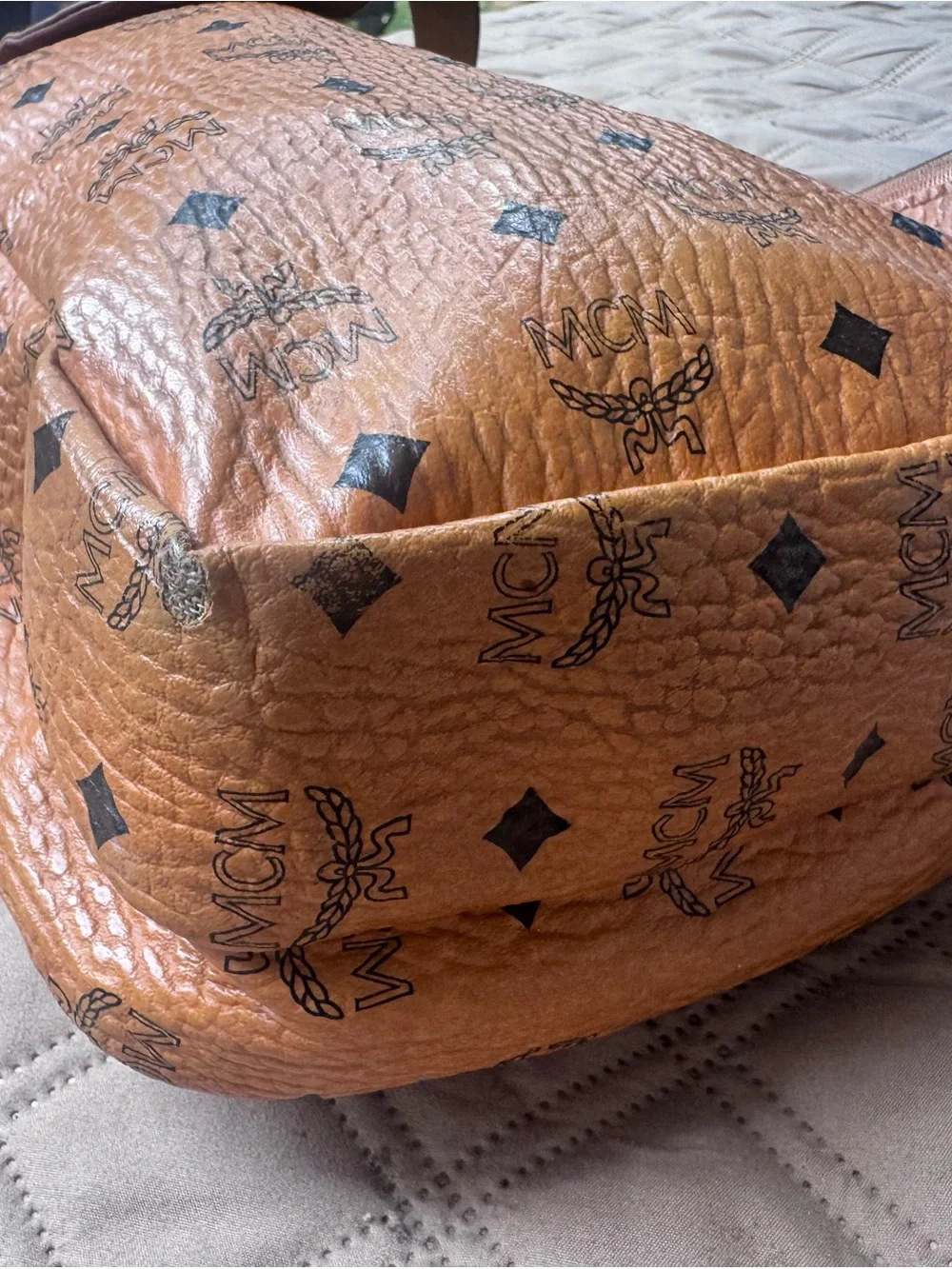 MCM Cognac Brown Logo Leather Sling Backpack with Gold Plaque